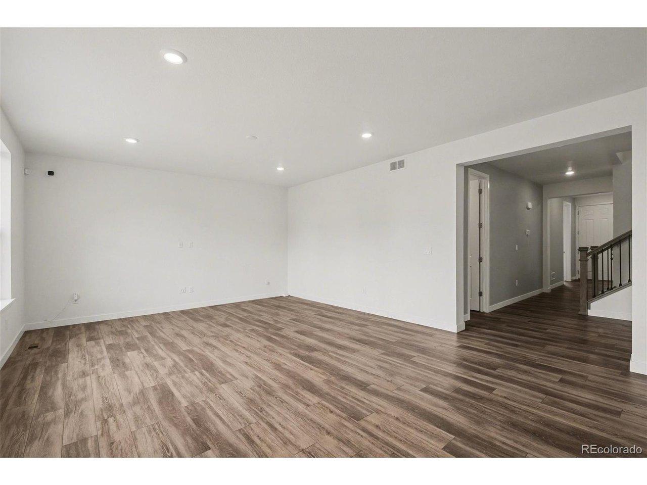 Image 3: Living Room leads to Front Entrance & NEXTGen Studio Image 3: Living Room leads to Front Entrance & NEXTGen Studio