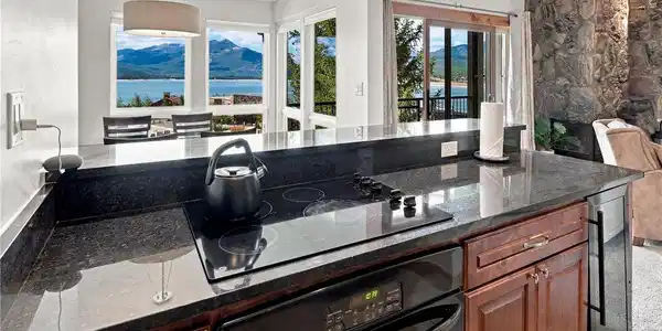 Image 4: View from your kitchen of Lake Dillon and the mountains. Granite counters, electric cooktop, oven and wine cooler Image 4: View from your kitchen of Lake Dillon and the mountains. Granite counters, electric cooktop, oven and wine cooler