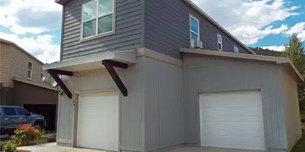 Image 2: Front View, 2 garages, driveway