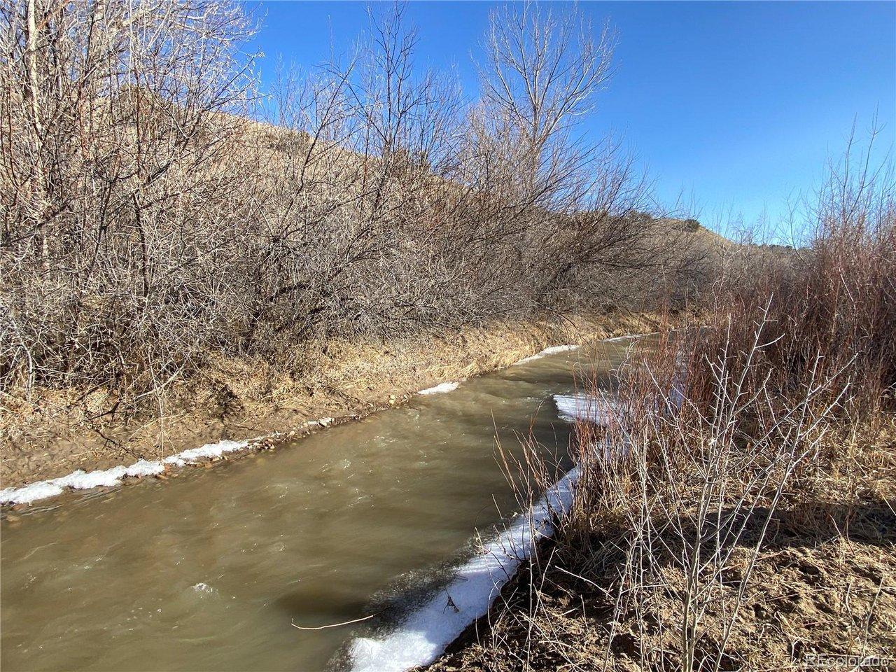 Image 1: River that runs through the property Image 1: River that runs through the property