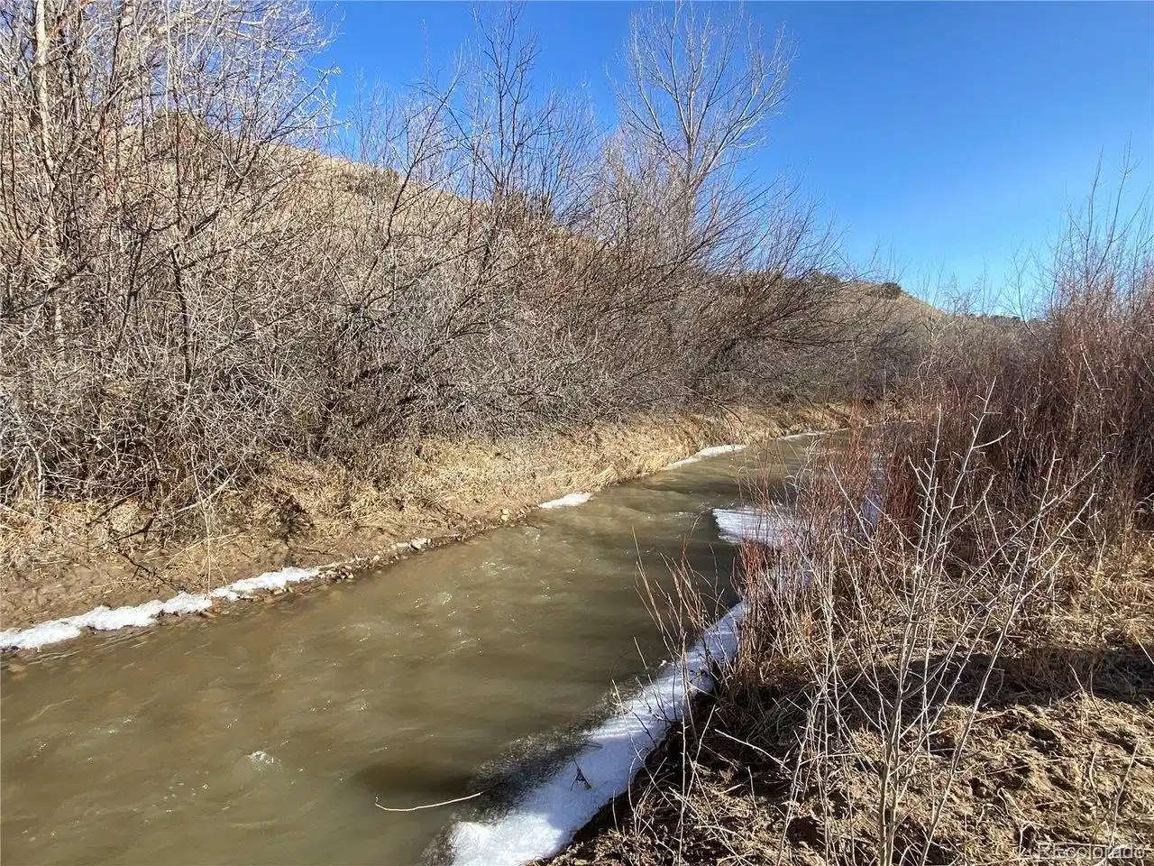 Image 1: River that runs through the property Image 1: River that runs through the property