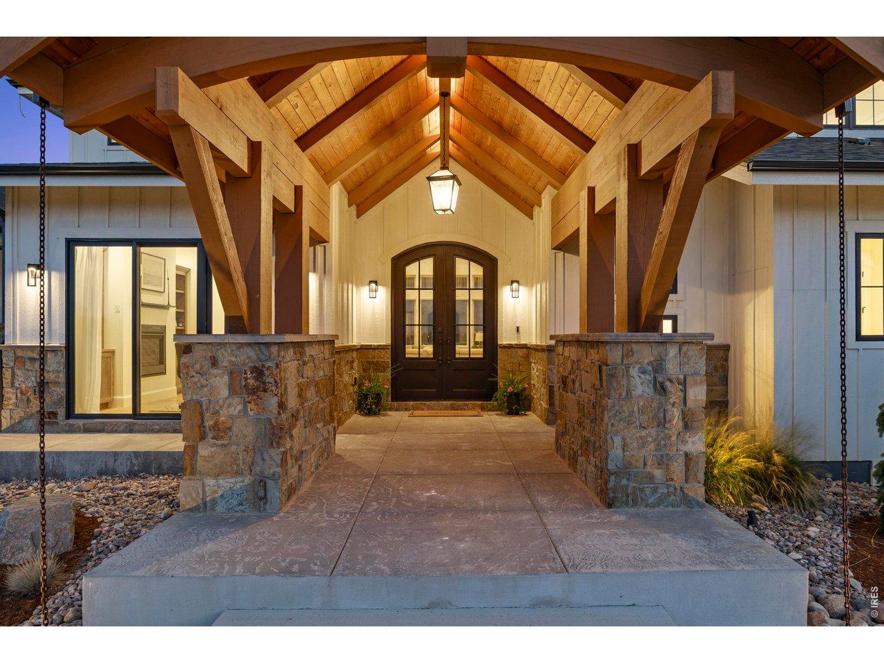 Image 3: A timber-and-beam entrance with a double iron door welcome you Image 3: A timber-and-beam entrance with a double iron door welcome you