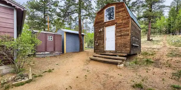 Image 2: Finished outbuilding guest space with electric and 2 nice sheds Image 2: Finished outbuilding guest space with electric and 2 nice sheds