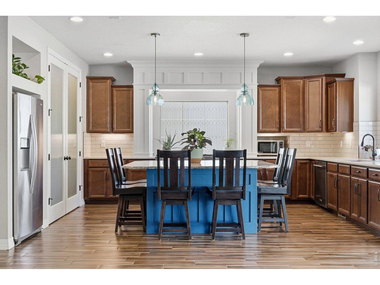 Image 4: The open layout connects the living room, dining area, and kitchen, creating a natural flow that feels both functional and welcoming. Image 4: The open layout connects the living room, dining area, and kitchen, creating a natural flow that feels both functional and welcoming.