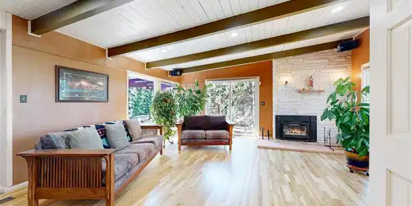 Image 4: Living Room with slider out to private falgstone patio