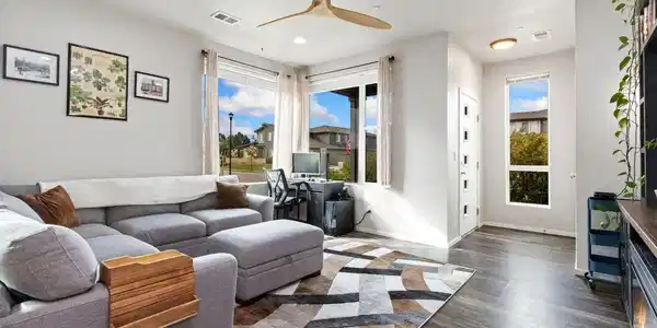 Image 4: Light and bright throughout, the entry opens to a spacious living room. Image 4: Light and bright throughout, the entry opens to a spacious living room.