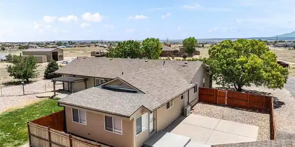 Image 4: The converted 2 car garage is a fully functional ADU with full kitchen, living room, bedroom, bath, enclosed porch, fenced yard Image 4: The converted 2 car garage is a fully functional ADU with full kitchen, living room, bedroom, bath, enclosed porch, fenced yard