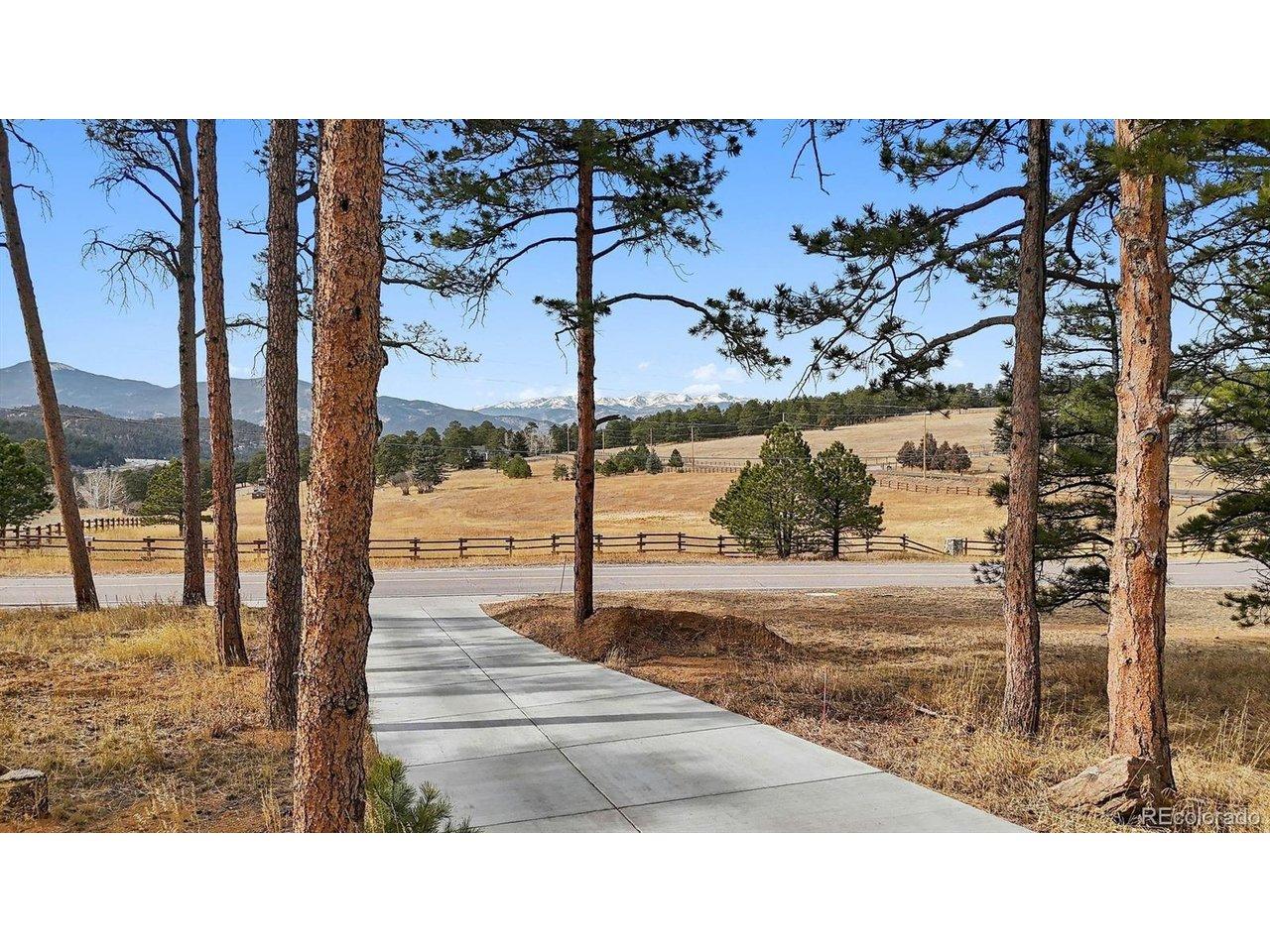 Image 2: Located just minutes from I-70, you are perfectly positioned for a seamless drive to the urban energy of Denver or the world-class slopes of the Rockies