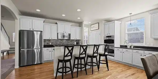 Image 3: Stainless steel appliances with a double oven