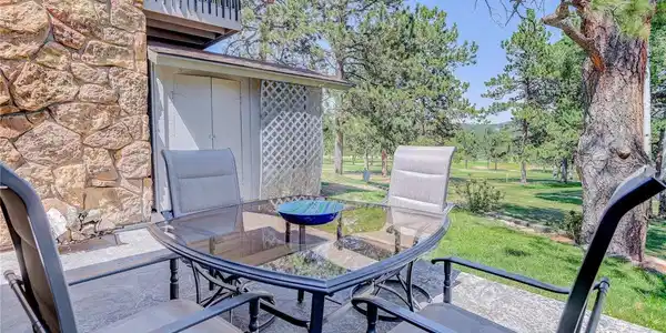 Image 3: Rear Patio with View of First Fairway and Mountains Beyond Image 3: Rear Patio with View of First Fairway and Mountains Beyond