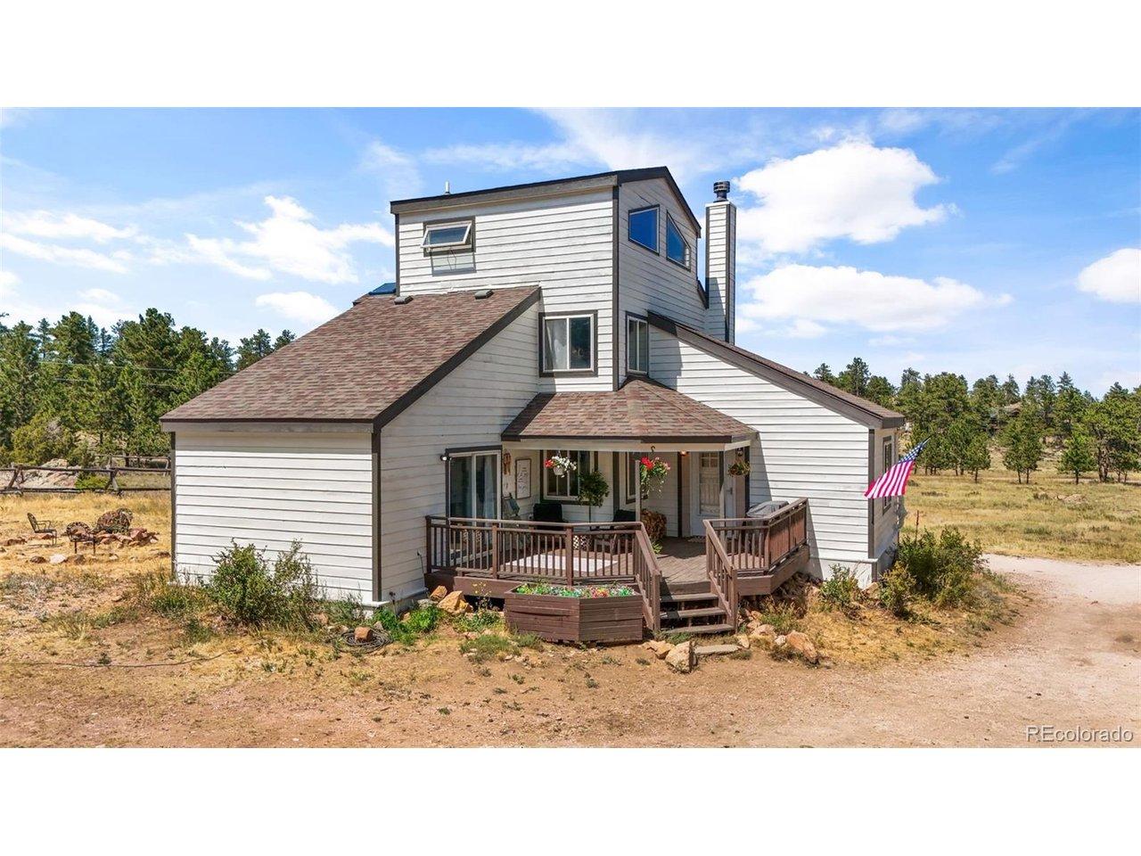 Image 1: Welcome home. Tucked on 2.52 private acres bordering National Forest, this is the kind of setting that stops people in their tracks. Image 1: Welcome home. Tucked on 2.52 private acres bordering National Forest, this is the kind of setting that stops people in their tracks.