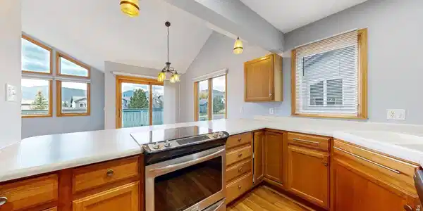 Image 3: Look out to the mountains while cooking in your Kitchen