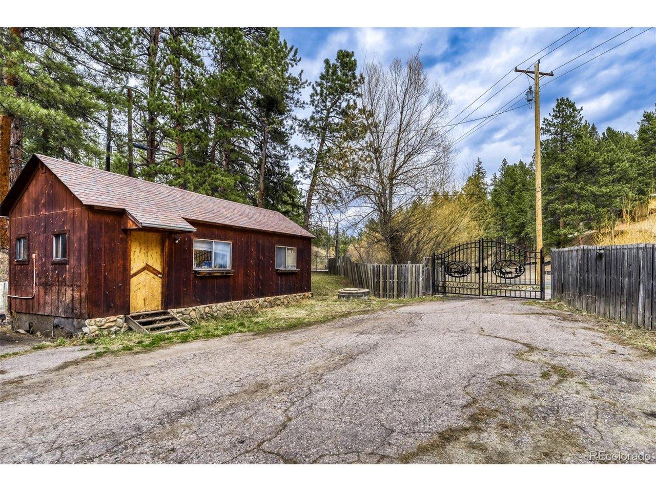 Image 3: Front Gate and Cabin Image 3: Front Gate and Cabin