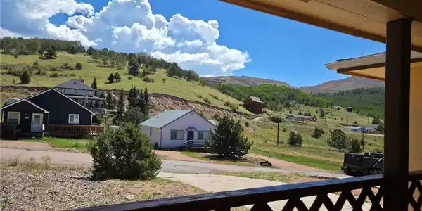 Image 4: Views of the Cripple Creek/Victor hillside make for an enjoyable spot from the covered front porch. Image 4: Views of the Cripple Creek/Victor hillside make for an enjoyable spot from the covered front porch.