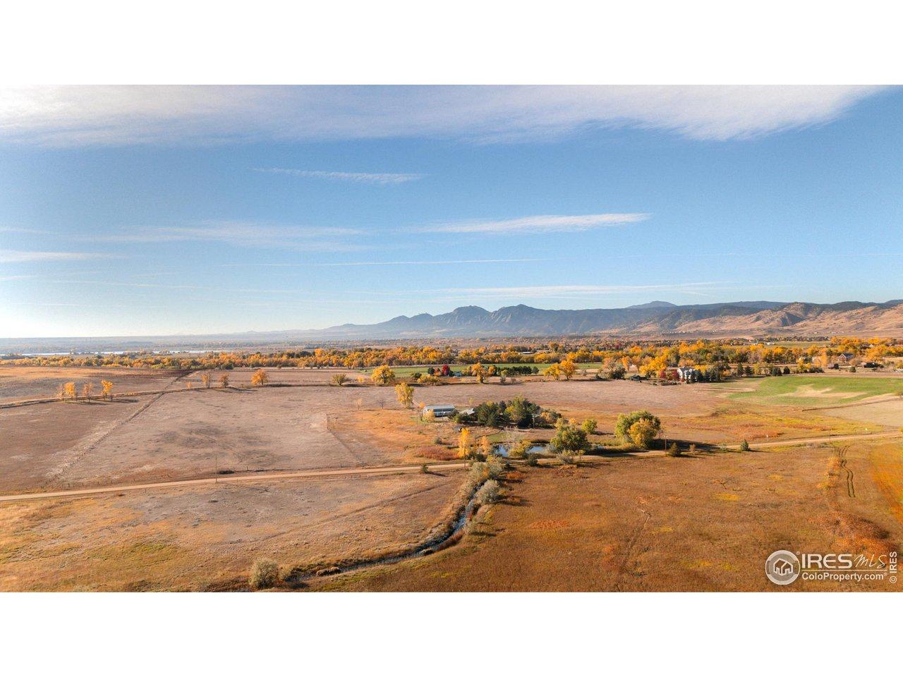 Image 2: Boulder flatirons and farmland. Image 2: Boulder flatirons and farmland.