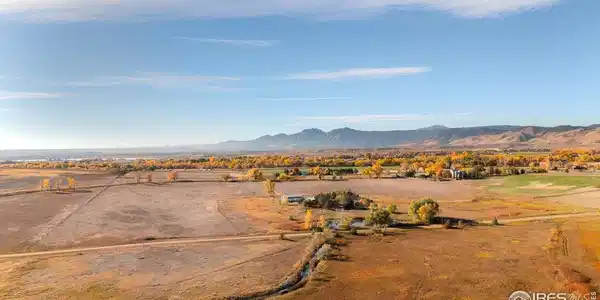 Image 2: Boulder flatirons and farmland. Image 2: Boulder flatirons and farmland.