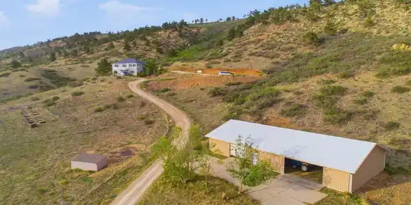Image 4: Freshly graded driveway - enormous 40x80 shop equals room for toys or hobby farm