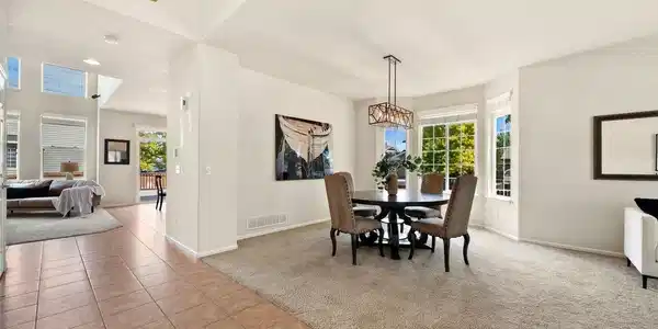 Image 4: Main entrance open to high ceilings and expansive formal dining with bay window Image 4: Main entrance open to high ceilings and expansive formal dining with bay window