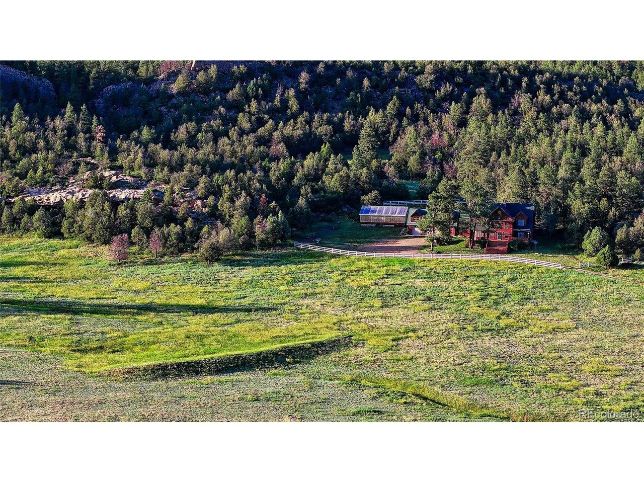Image 4: Drone View - Front of Property