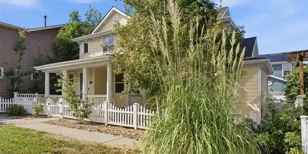 Image 2: Green belt in front of the home