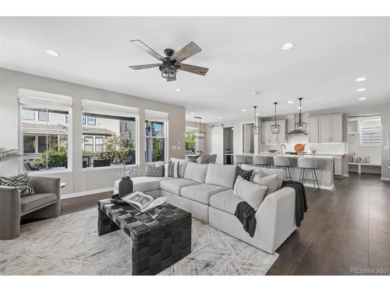 Image 3: Great room looking into kitchen and dining room Image 3: Great room looking into kitchen and dining room