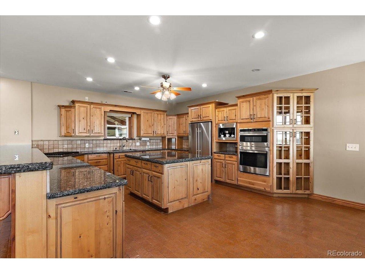 Image 4: Center island in kitchen measures 4ft. 6 in. X 5 ft.