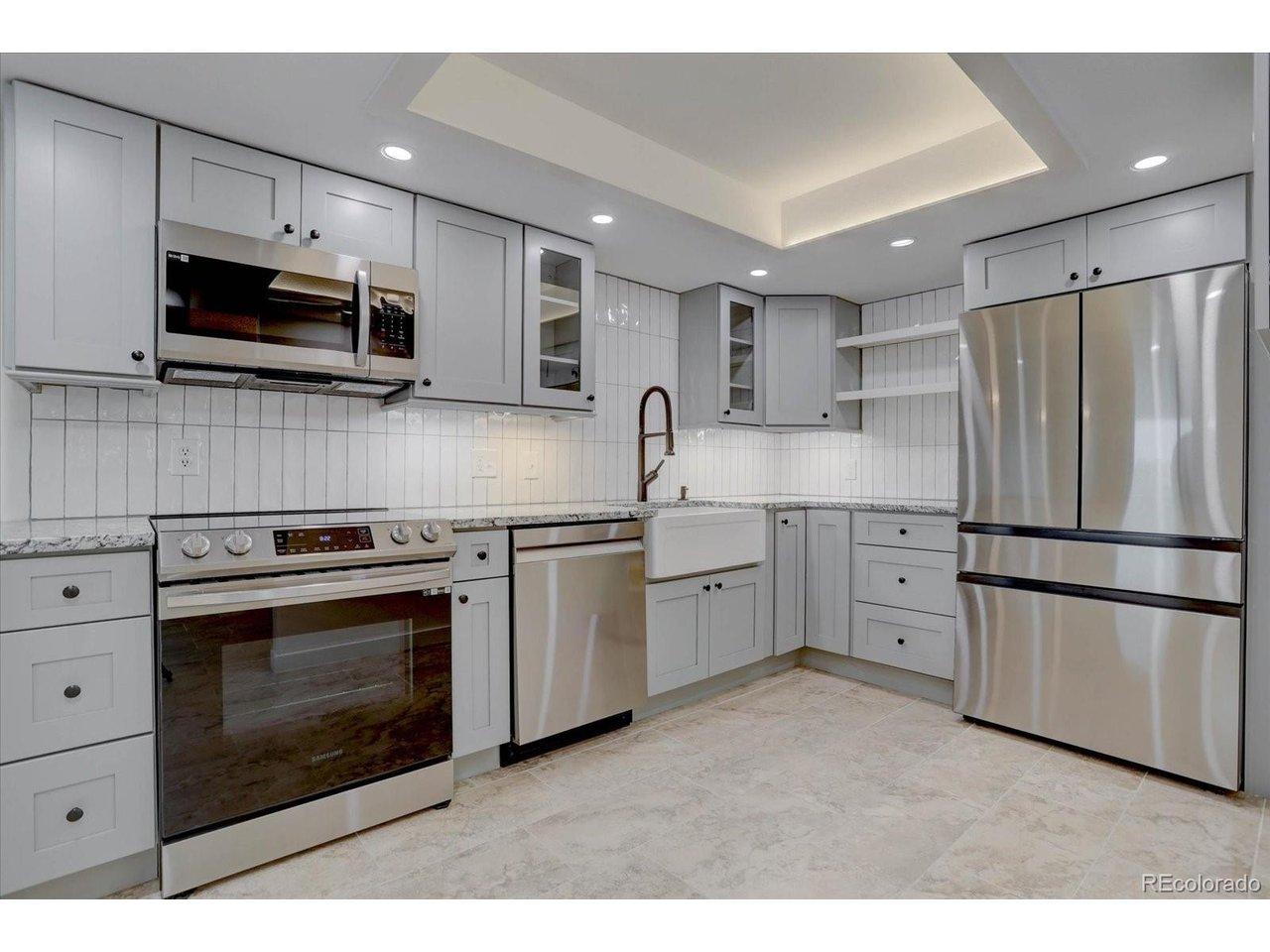Image 1: Beautifully renovated kitchen. Condo qualifies for lender credit - ask for details