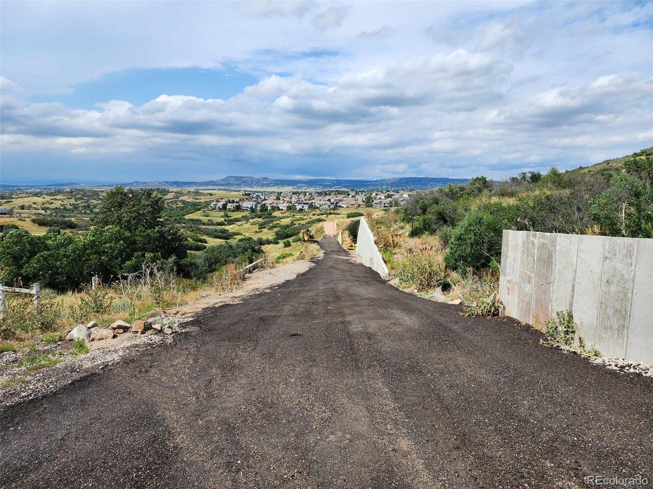 Image 3: New Paved Road Going In