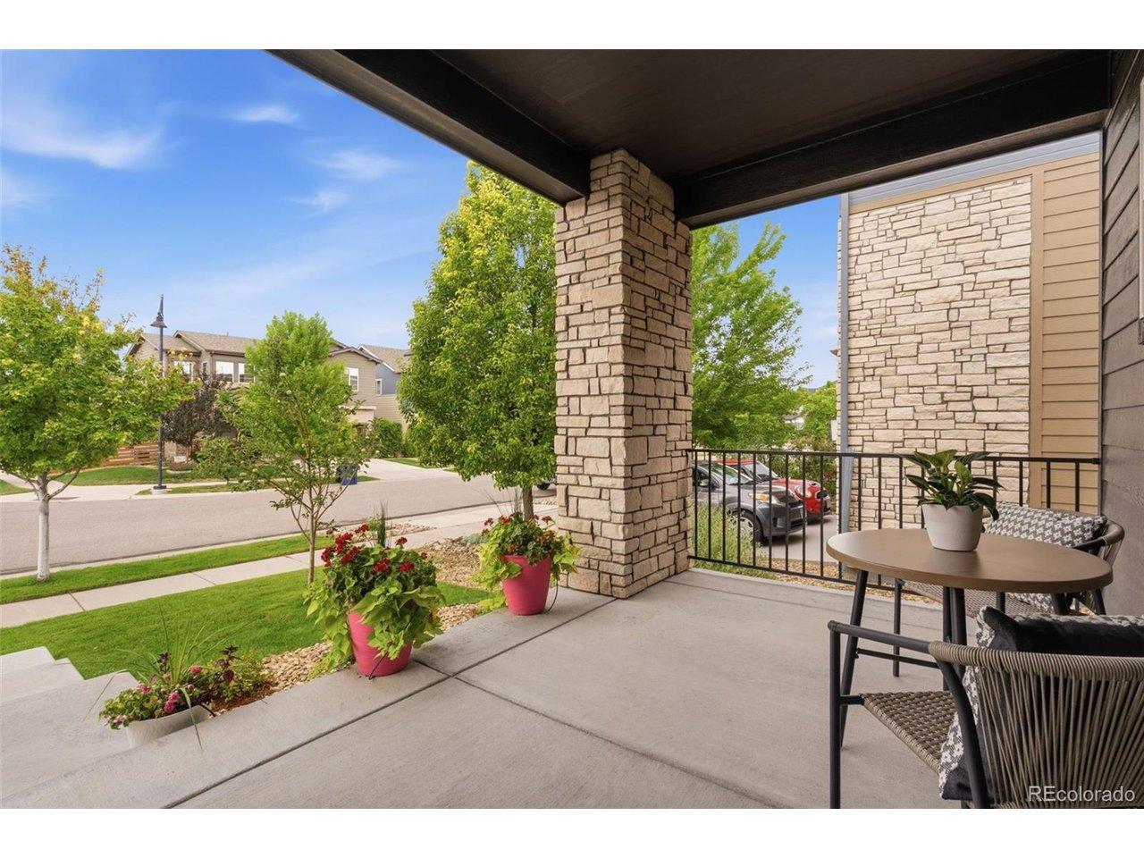 Image 2: Spacious and Inviting Front Porch