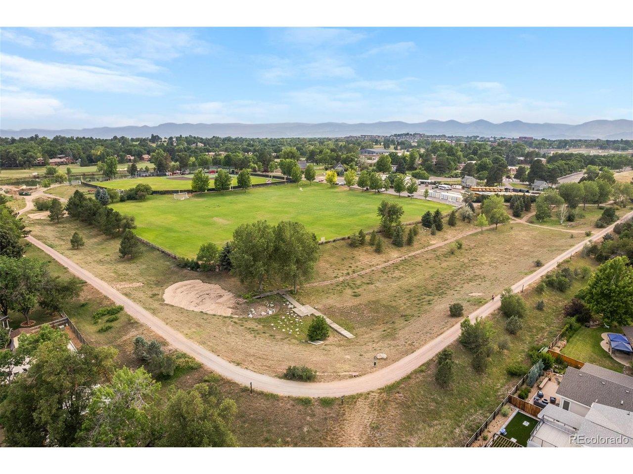 Image 4: Aerial view showcasing the Colorado Academy campus directly behind the home, creating a rare sense of privacy and openness. Image 4: Aerial view showcasing the Colorado Academy campus directly behind the home, creating a rare sense of privacy and openness.
