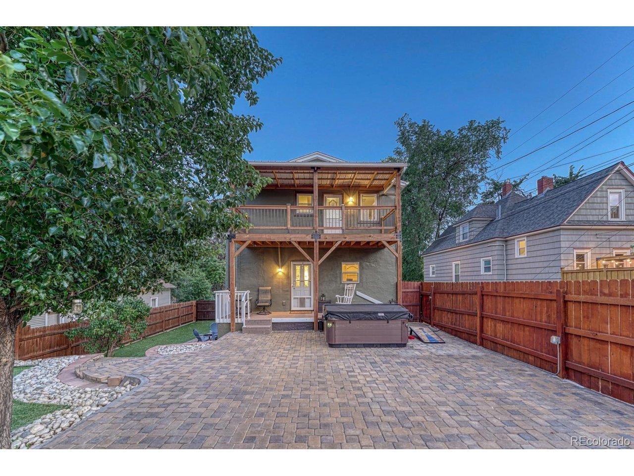 Image 4: Covered back patio - hot tub included! Image 4: Covered back patio - hot tub included!