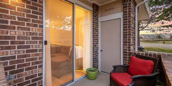 Image 2: The PRIVATE patio looks out upon the mountains and a landscaped stone wall rather than more homes or a parking lot.
