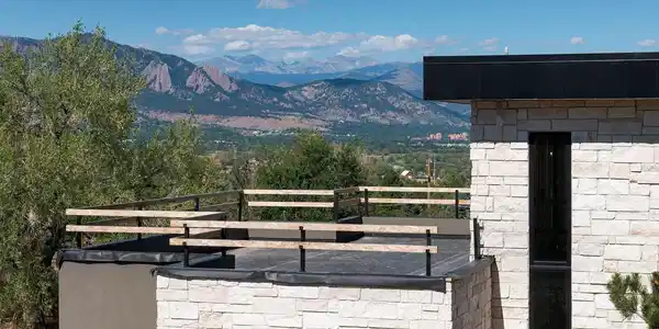 Image 4: Actual photo of exterior - taken Sept 2026 - upstairs rooftop deck