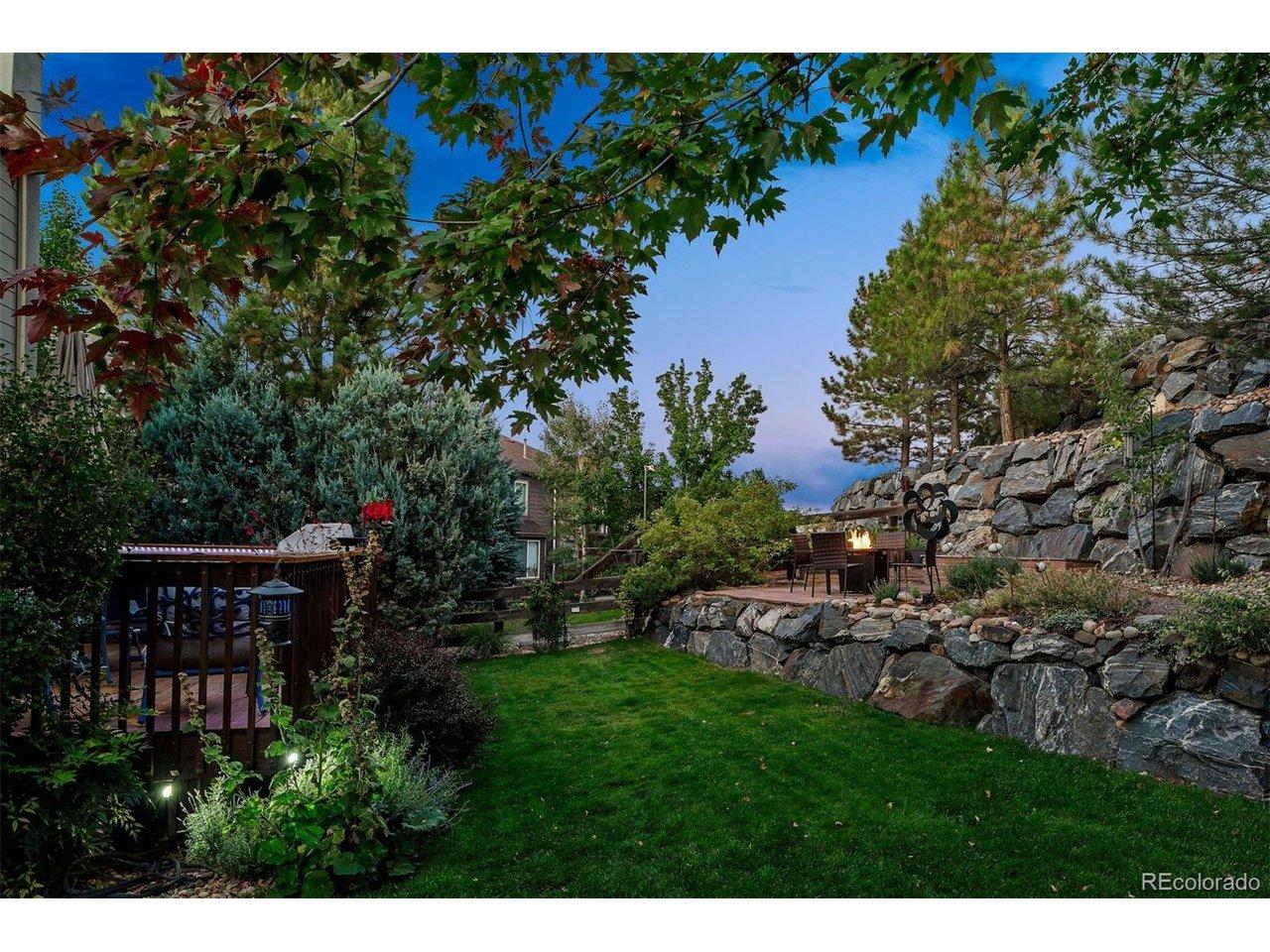 Image 2: Tranquil setting with landscaped backyard, terraced stonework and elevated patio. Image 2: Tranquil setting with landscaped backyard, terraced stonework and elevated patio.