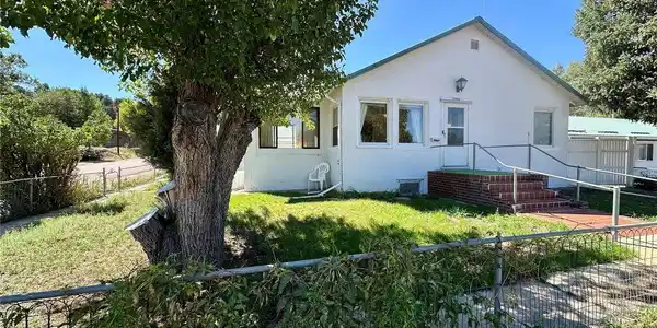 Image 3: Once an apple orchard, this is the last of the original apple trees perfectly located in front of the home Image 3: Once an apple orchard, this is the last of the original apple trees perfectly located in front of the home