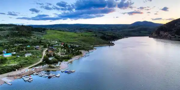Image 4: Aerial of Green Mountain Res and shoreline. Photos were taken in June 2024 and are representative of seasonal conditions. Image 4: Aerial of Green Mountain Res and shoreline. Photos were taken in June 2024 and are representative of seasonal conditions.