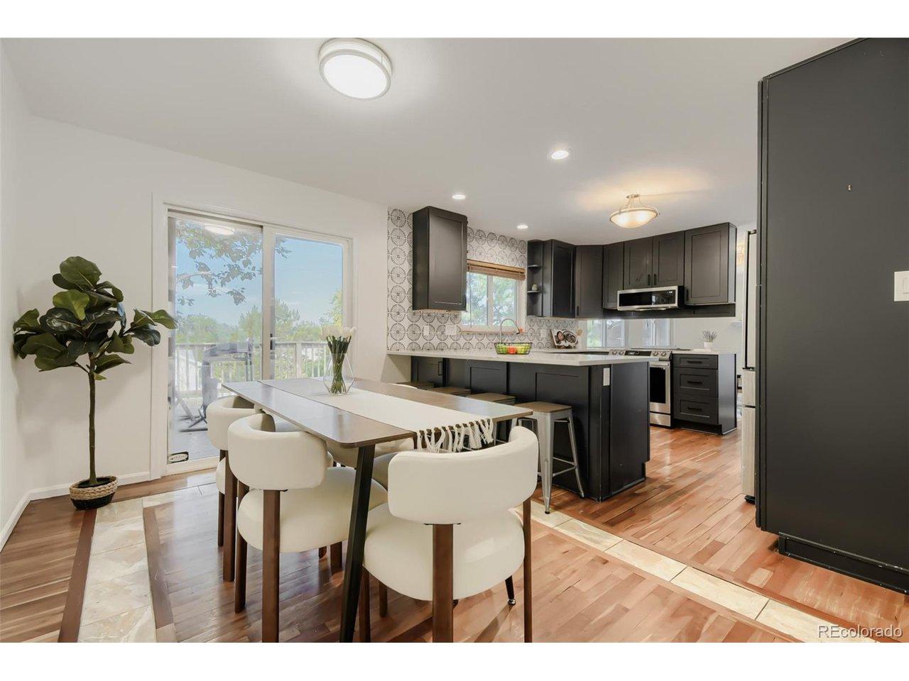 Image 3: Kitchen dining area opening to large patio deck with awesome views Image 3: Kitchen dining area opening to large patio deck with awesome views
