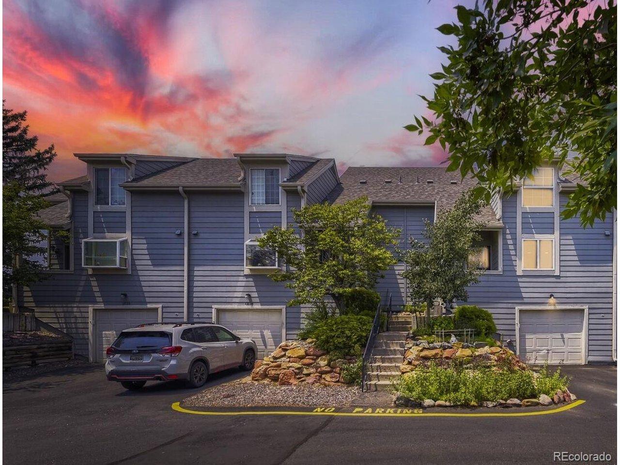 Image 2: Front of townhome lit up Image 2: Front of townhome lit up