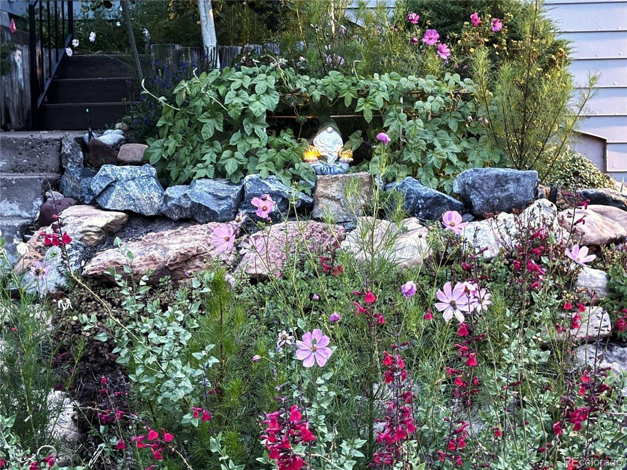 Image 3: Irrigated Colorado rock garden welcomes you on your way to the front door Image 3: Irrigated Colorado rock garden welcomes you on your way to the front door