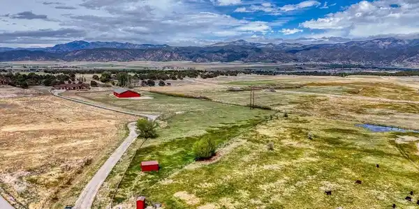 Image 3: The Property features the home, geodesic dome, the barn and it's feed room, tack room and equipment storage, and at the sourthern end of the fenced lot is a two stall loafing shed with a 100 sqft storage/tack room