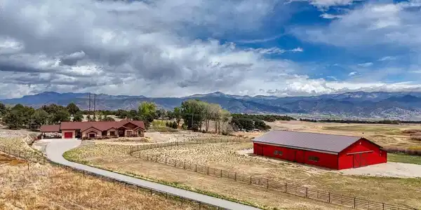 Image 4: This Photo Shows the northern half of the 10 +/- lot with barn, home and geodesic dome (in back yard)