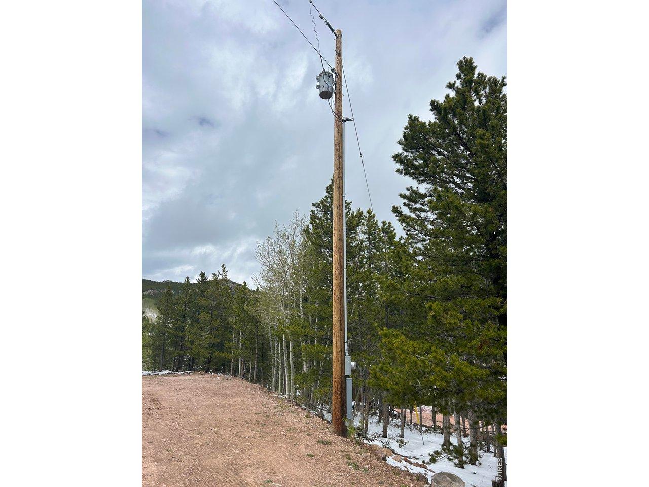 Image 4: Electric pole is already on the property Image 4: Electric pole is already on the property