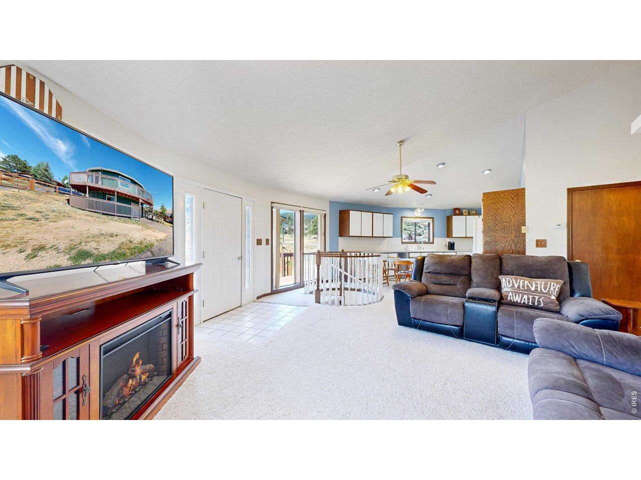 Image 3: Here is another view of the living area and the kitchen Image 3: Here is another view of the living area and the kitchen