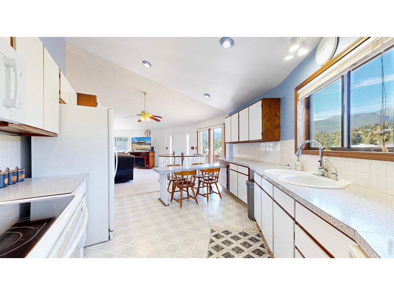 Image 4: Bright Kitchen with lots of cabinet and counter space and views from your window Image 4: Bright Kitchen with lots of cabinet and counter space and views from your window