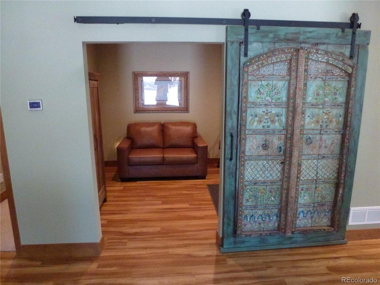 Image 3: From front entry, looking in to the Office/den Image 3: From front entry, looking in to the Office/den