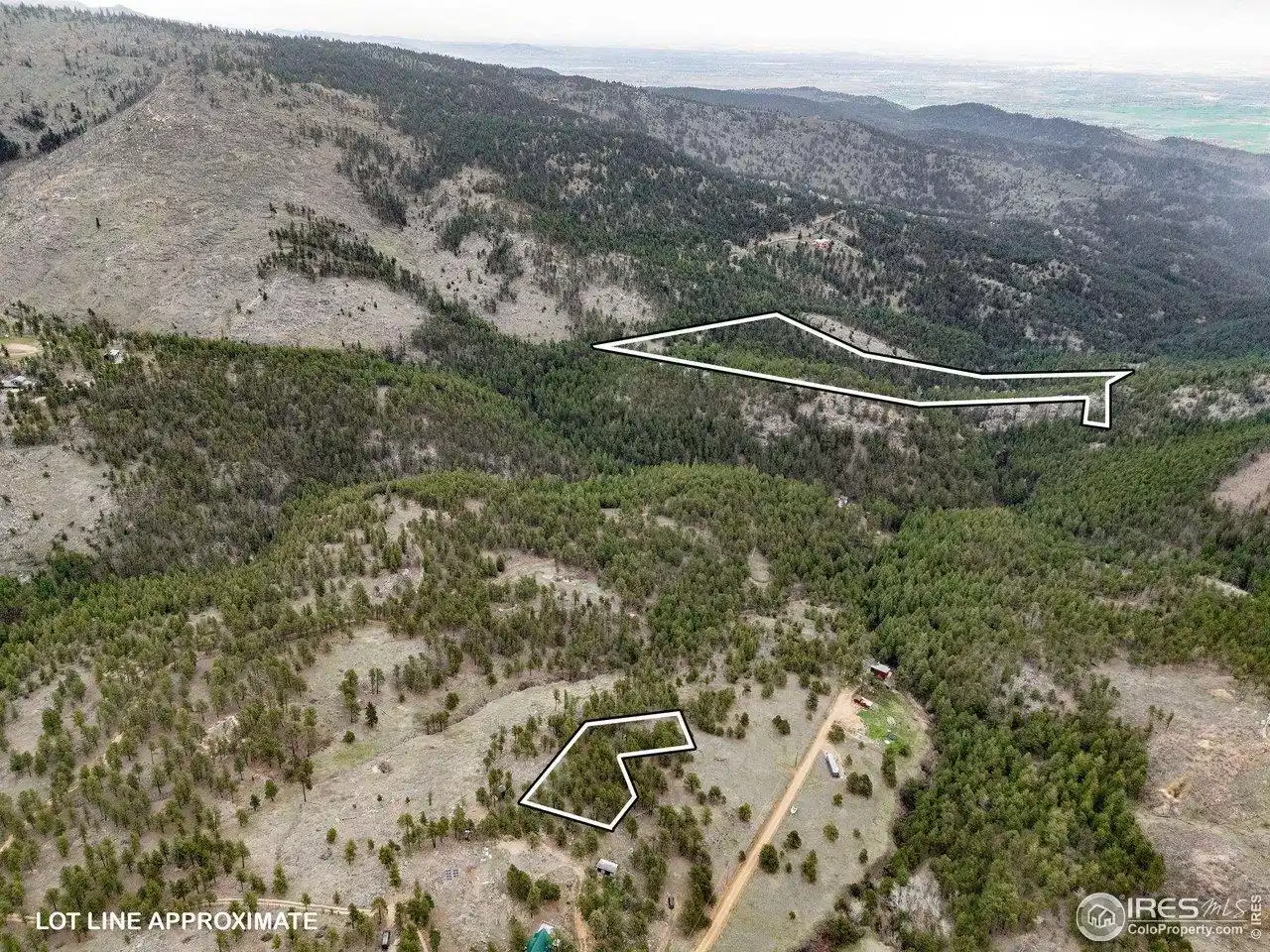 Image 1: Please be aware that any land and/or structures shown in the listing photos outside of the approximate lot lines are not  for sale.