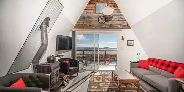Image 4: Main level living room with reclaimed wood accents Image 4: Main level living room with reclaimed wood accents