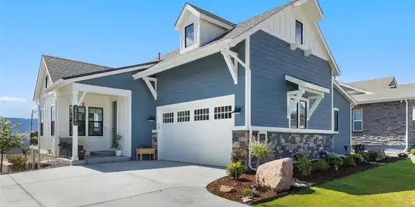 Image 4: Covered Front Porch and professionally maintained landscaping Image 4: Covered Front Porch and professionally maintained landscaping