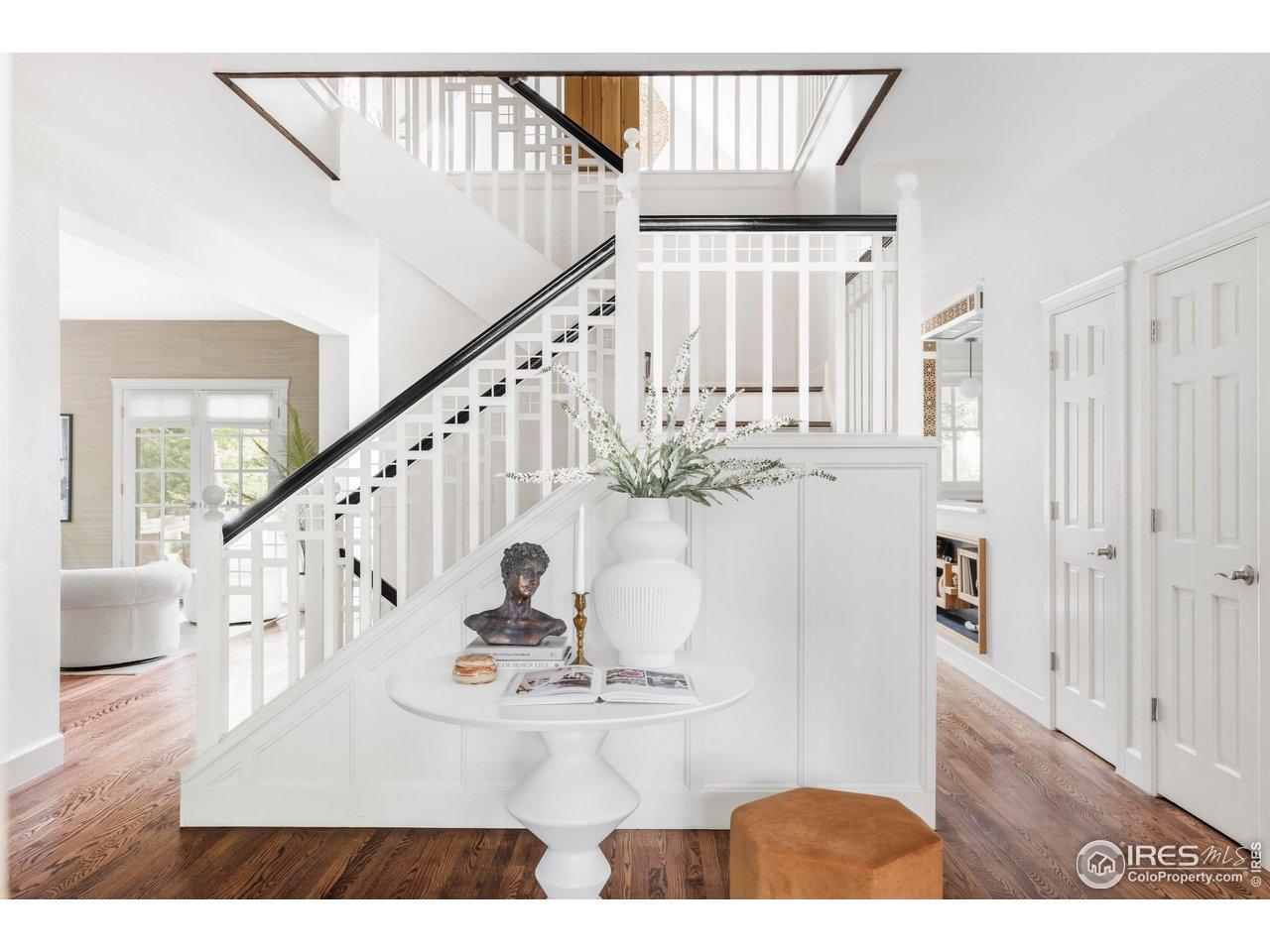 Image 3: Step inside to a welcoming foyer where hardwood floors extend across beautifully appointed living spaces. Image 3: Step inside to a welcoming foyer where hardwood floors extend across beautifully appointed living spaces.