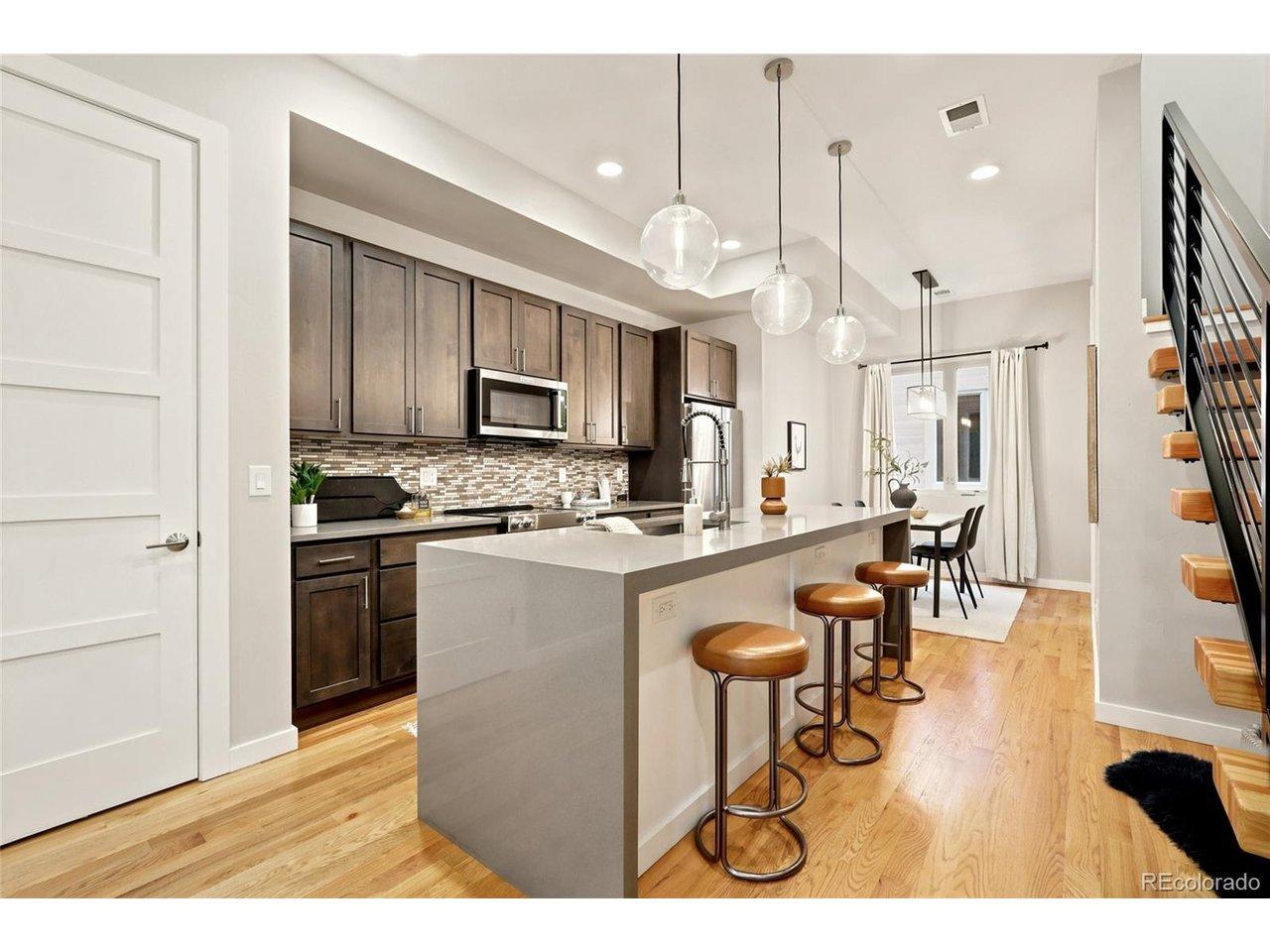 Image 2: quartz countertops & bar seating